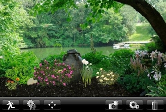 Garden design in progress with a pond background and flowering plants